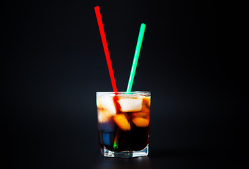 soft drinks. Cola glass with ice cubes on a white background