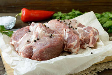 marinaded pork neck chops, uncooked