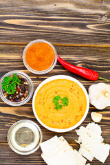 Hummus with Curry, Turmeric, Raw Chickpeas on the Boards
