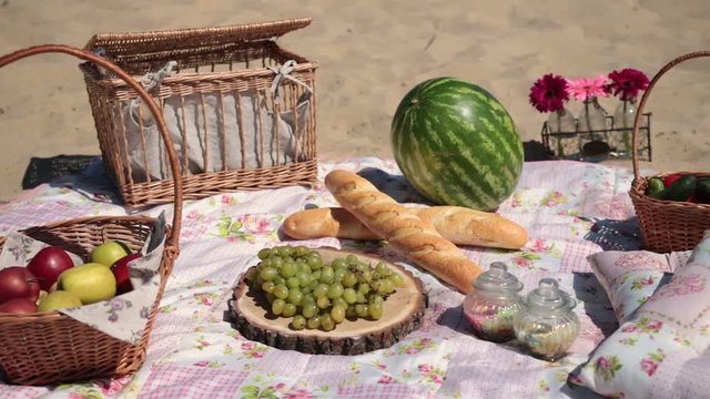 Picnic with different sorts of snacks on blanket