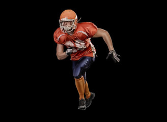 Professional american football player on black background