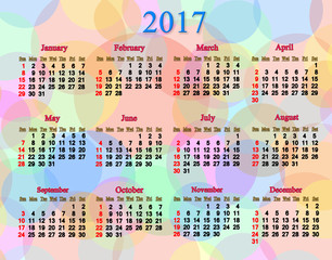 calendar for neat 2017 year with multicolored rings and circles