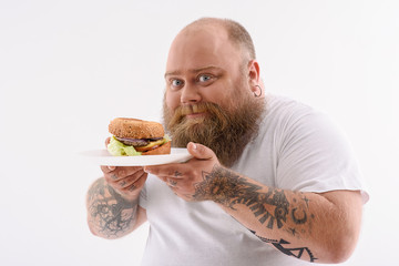 Man with a cheeseburger