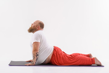 Relaxed man doing yoga