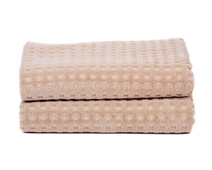 Organic cotton folded bath towel separated on white background