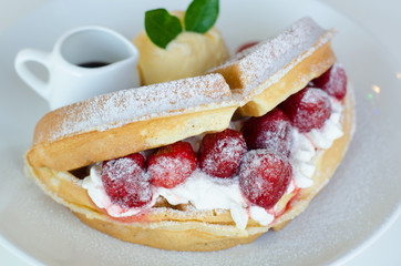 Strawberry waffle with ice cream