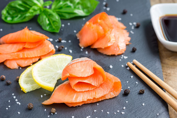 Smoked salmon filet with soy sauce, horizontal, closeup
