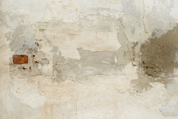 Wall fragment with attritions and cracks