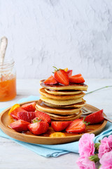 Breakfast pancakes with fresh strawberry