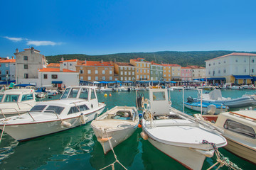 Fototapeta na wymiar Fishing boats in marine in town of Cres, waterfront, Island of Cres, Kvarner, Croatia 