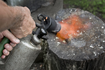 Hand With Blowntorch