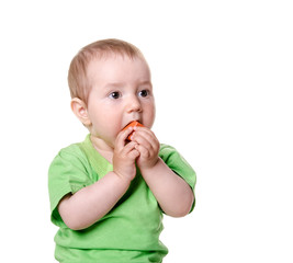 Baby playing with cube isolated on white