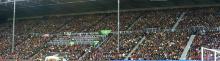Blurred crowd in the football stadium
