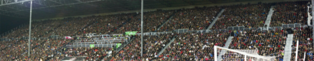 Blurred crowd in the football stadium © erika8213