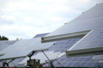 Solar panels used to generate electricity from sunlight. Close-up. Shallow depth of field.