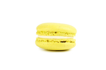 French yellow macaron isolated on a white