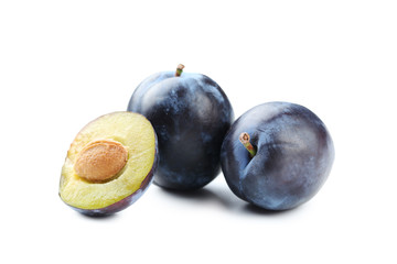 Tasty and ripe plums isolated on a white