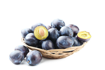 Tasty and ripe plums isolated on a white