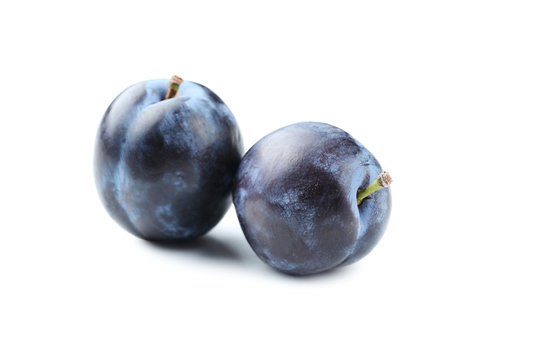 Tasty and ripe plums isolated on a white