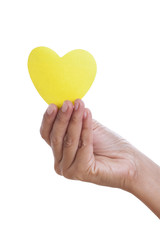 Fototapeta premium A female hand holding paper heart, isolated on white background. with using path 