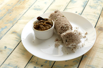 South Indian Steamed Brown Rice Cake (Puttu) with Arabian Camel Roast