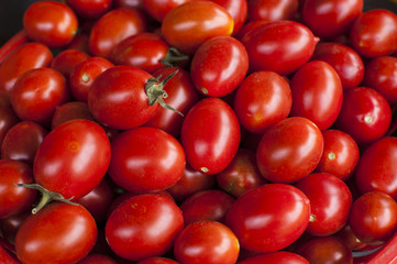 Fresh tomatoes cherry close up view background