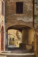 Fototapeta na wymiar Old passage in the Tuscan town of Sant'Angelo in Colle.