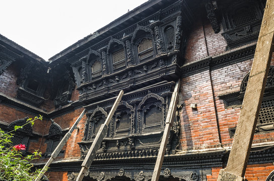 Stunning architecture in the Kumari Ghar temple of the living goddess Kumari Devi after major earthquake in 2015, Kathmandu, Nepal - The Kumari Ghar houses the Kumari Devi in Kathmandu, Nepal
