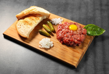 Tartare on cutting board