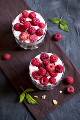 parfait dessert with raspberries and granola