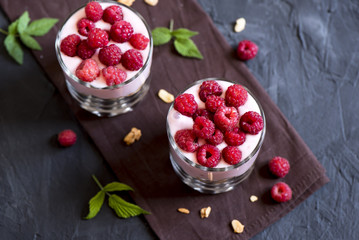 parfait dessert with raspberries and granola