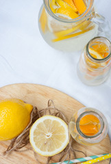 The lemon and homemade lemonade on the Board top view