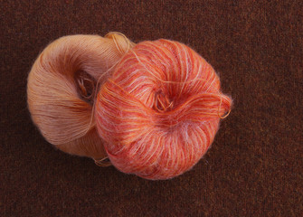 Orange ball of mohair wool yarn