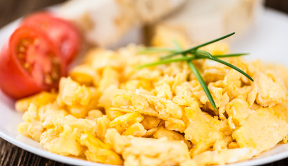 Plate with scrambled Eggs (close-up shot)