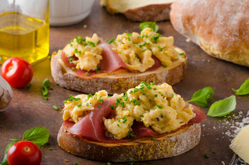 Delicious toasted bread with scrambled eggs