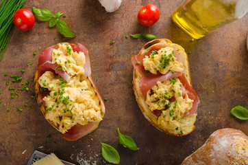 Delicious toasted bread with scrambled eggs