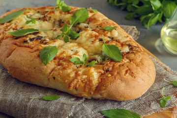Focaccia with onions, herbs and cheese.