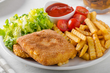 Fried cheese with french fries and lettuce
