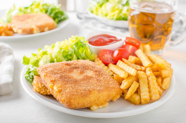Fried cheese with french fries and lettuce