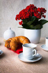 Coffee and croissant for breakfast