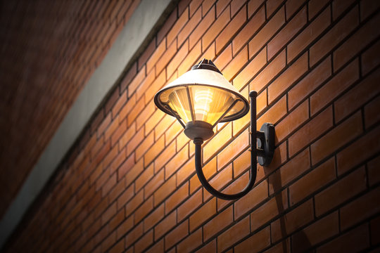 Night Lighting Lamp On The Brick Wall Vintage Style Outdoor Walkway Walking University Or College Space Decoration.