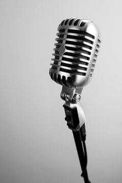 Vintage microphone on white background