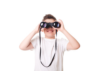 little boy is looking through binoculars. Isolated over white ba