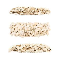 Line of pumpkin seeds isolated