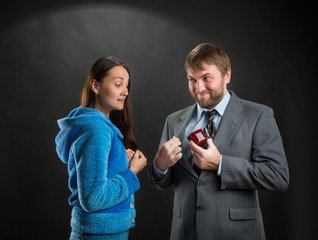 Businessman putting a gift-box in the pocket