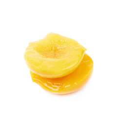 Canned peach half isolated