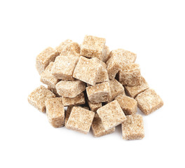 Pile of brown sugar cubes isolated