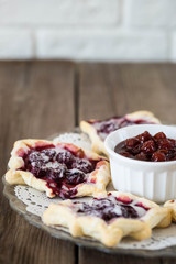 Homemade cherry pie on rustic background
