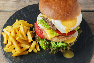 hamburger meat cutlet  egg cheese french fries