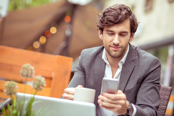 A handsome young man on the terrace